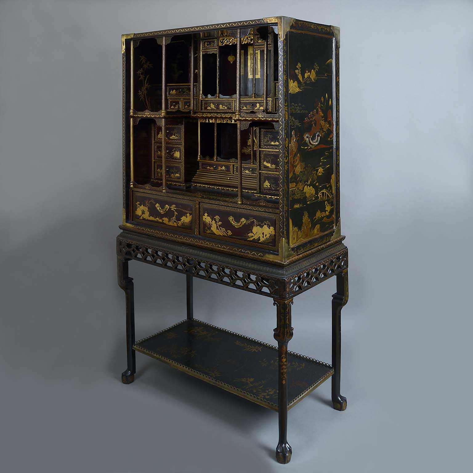 Chinese Export Gilt Decorated Black and Red Lacquer Cabinet on Stand