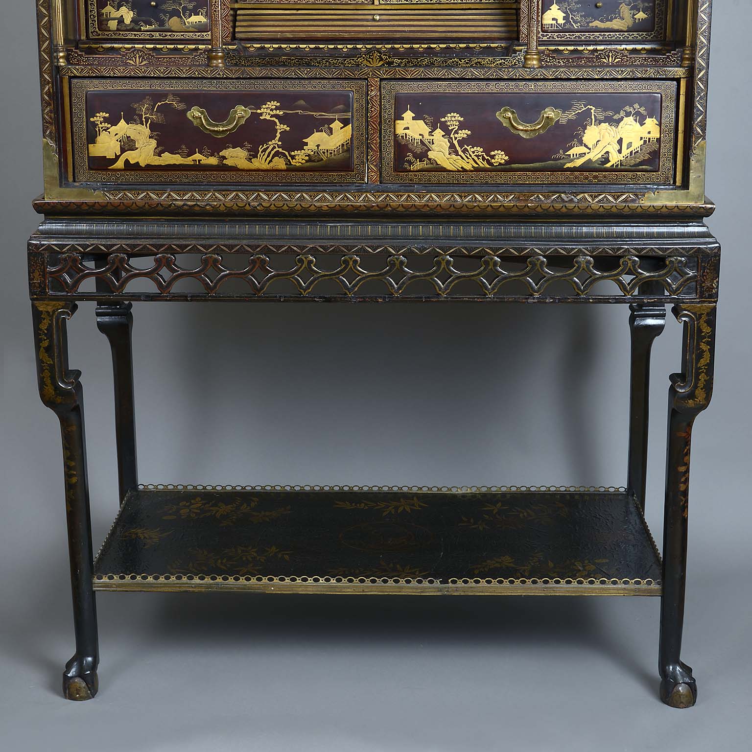 Chinese Export Gilt Decorated Black and Red Lacquer Cabinet on Stand