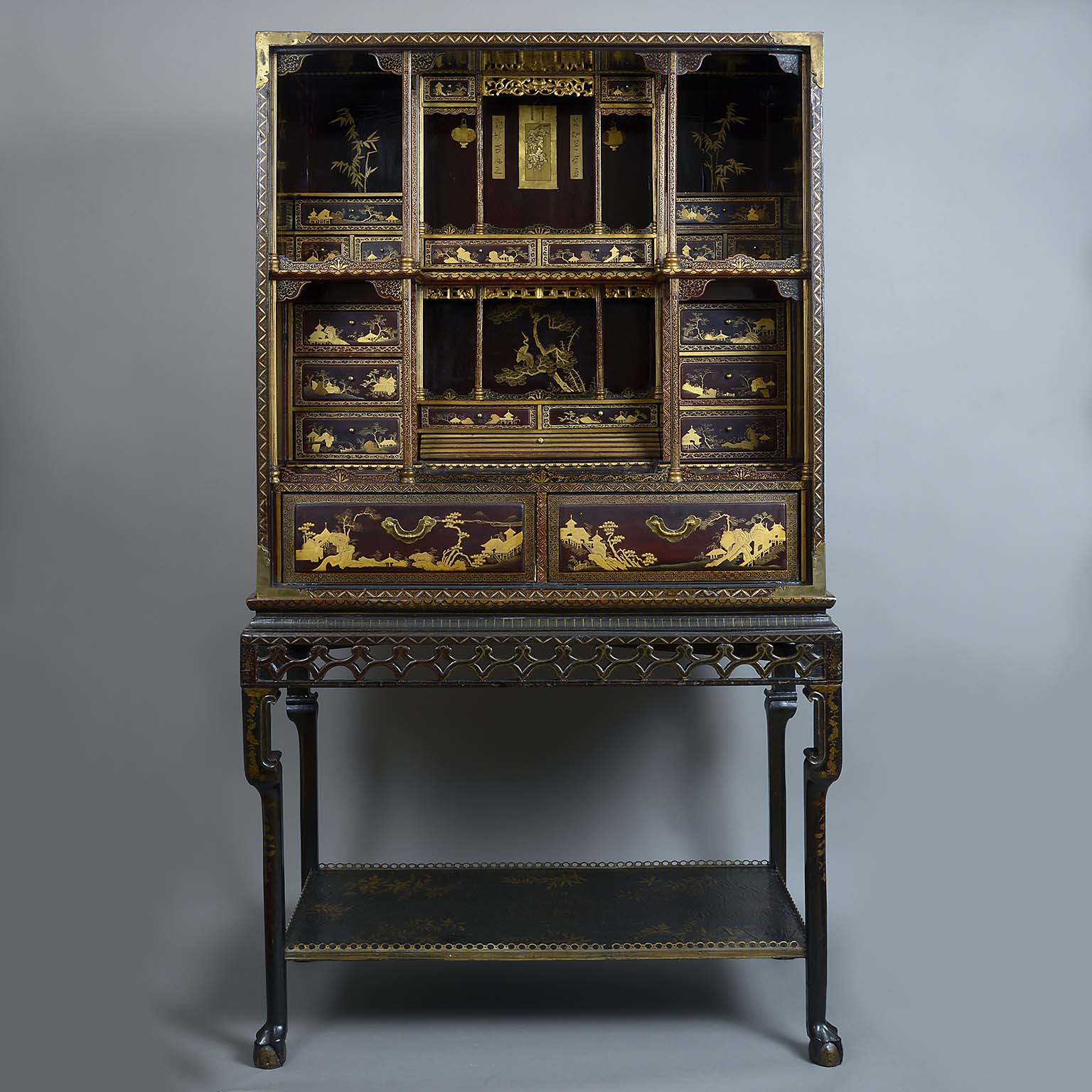 Chinese Export Gilt Decorated Black and Red Lacquer Cabinet on Stand