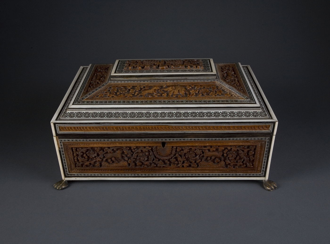 10.  A Carved Sandalwood and Sadeli Work Box
