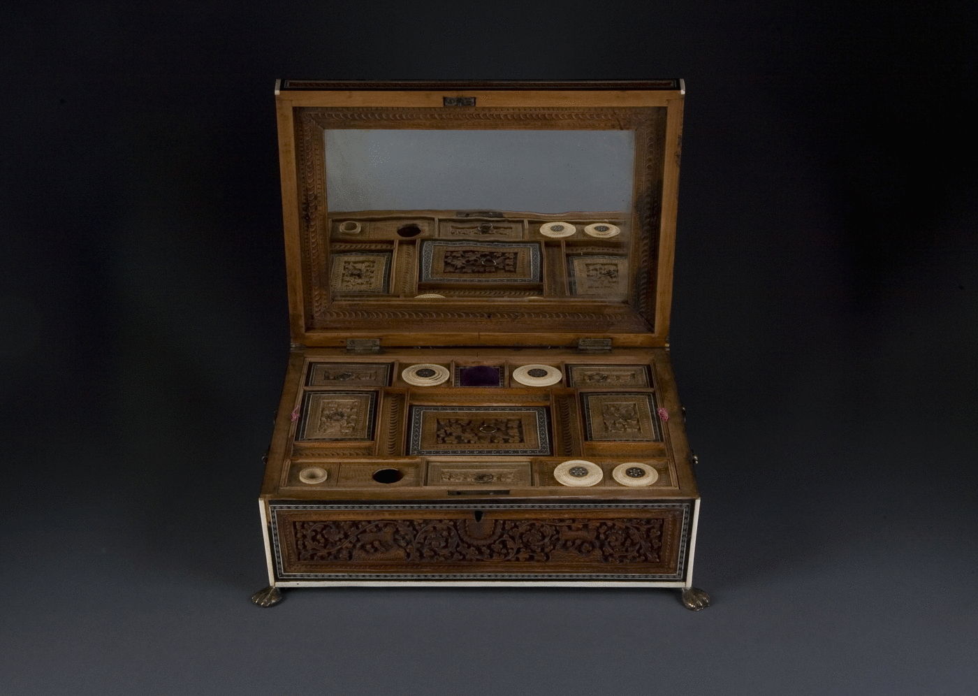 10.  A Carved Sandalwood and Sadeli Work Box