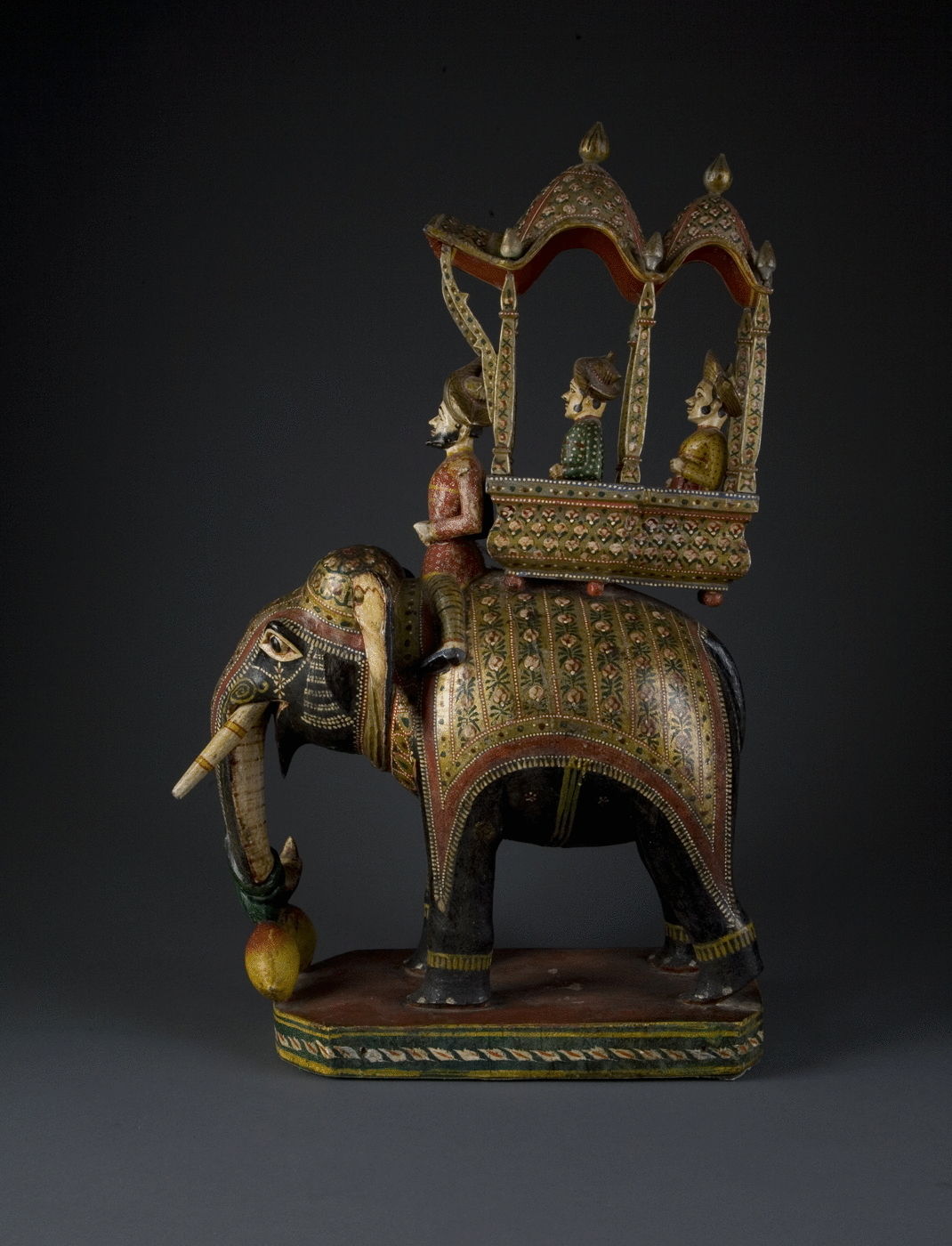 17.  A Polychrome Carved Wood Elephant With Mahout