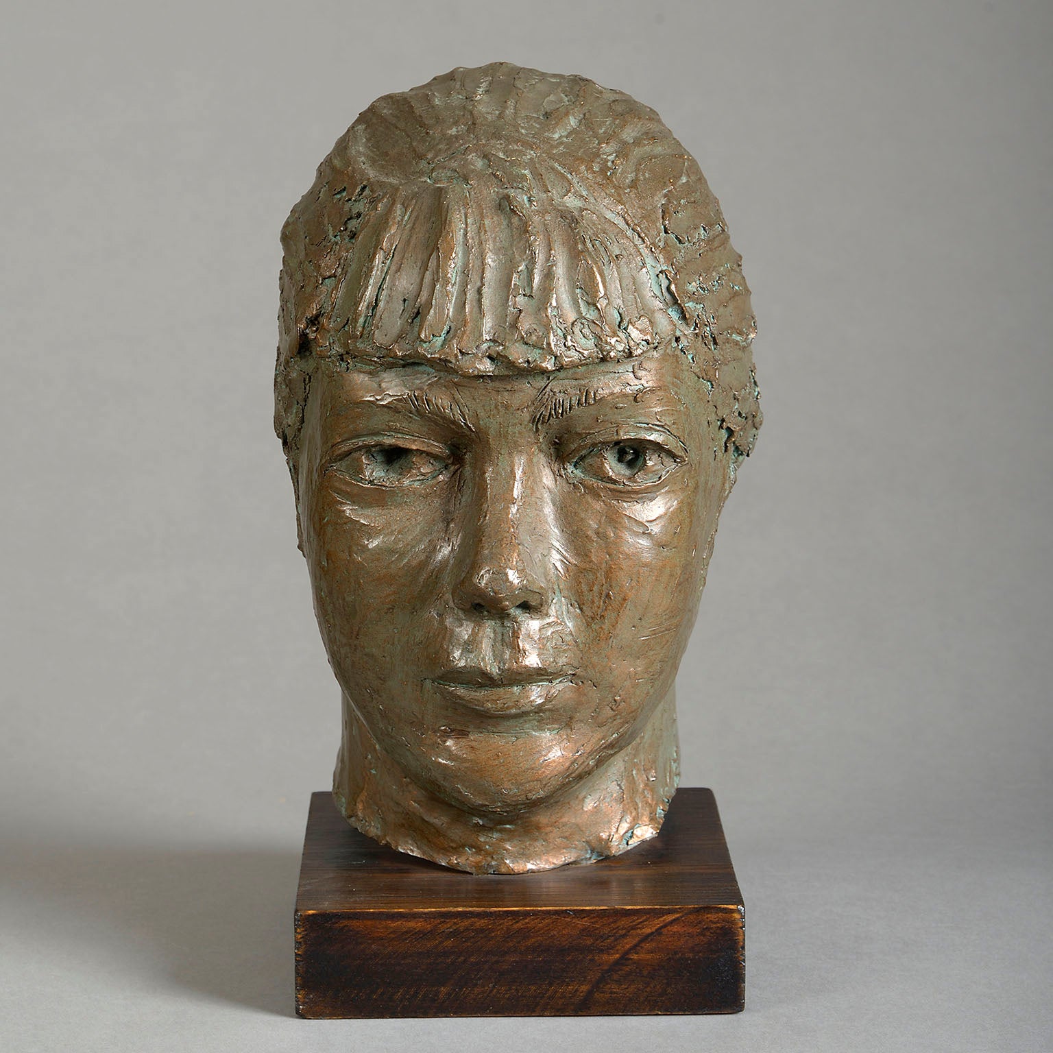 Bronzed Plaster Head of a Young Woman
