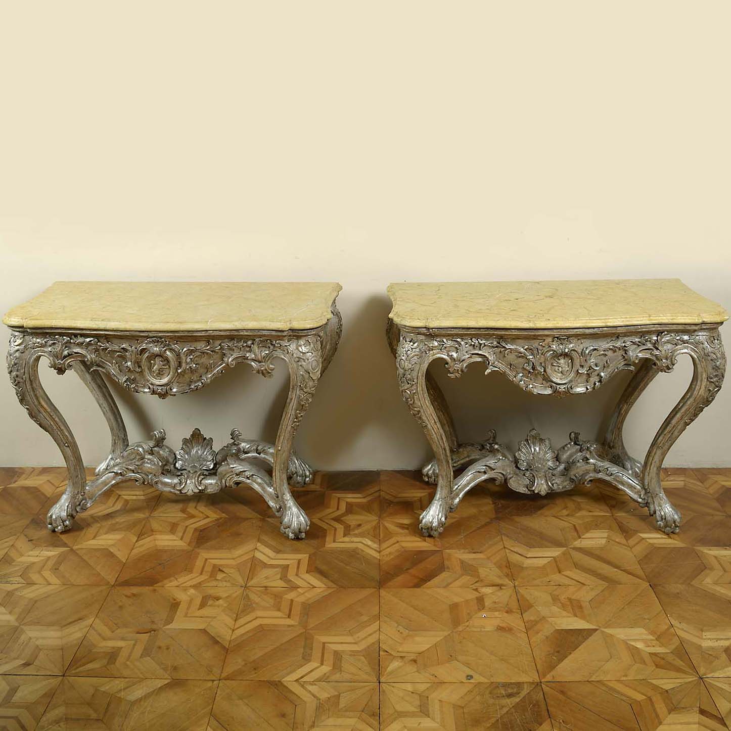 Pair of Rococo Carved Silver Giltwood Console Tables