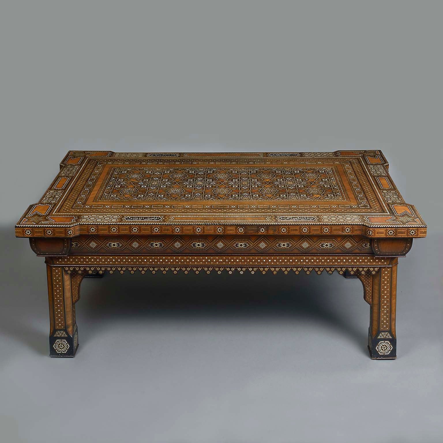 Islamic Geometric Bone Inlaid Low Table of Substantial Proportions Bearing Proverbs in Arab Calligraphy