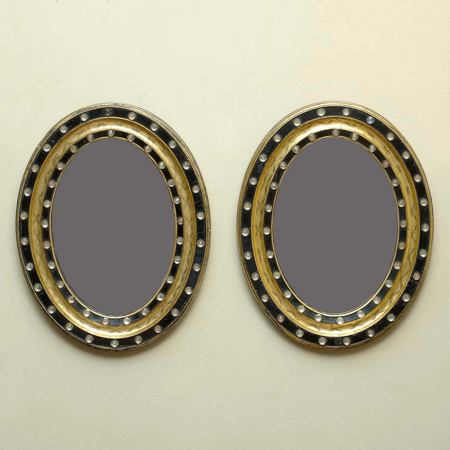 A Pair of Oval Irish Early Nineteenth Century Mirrors