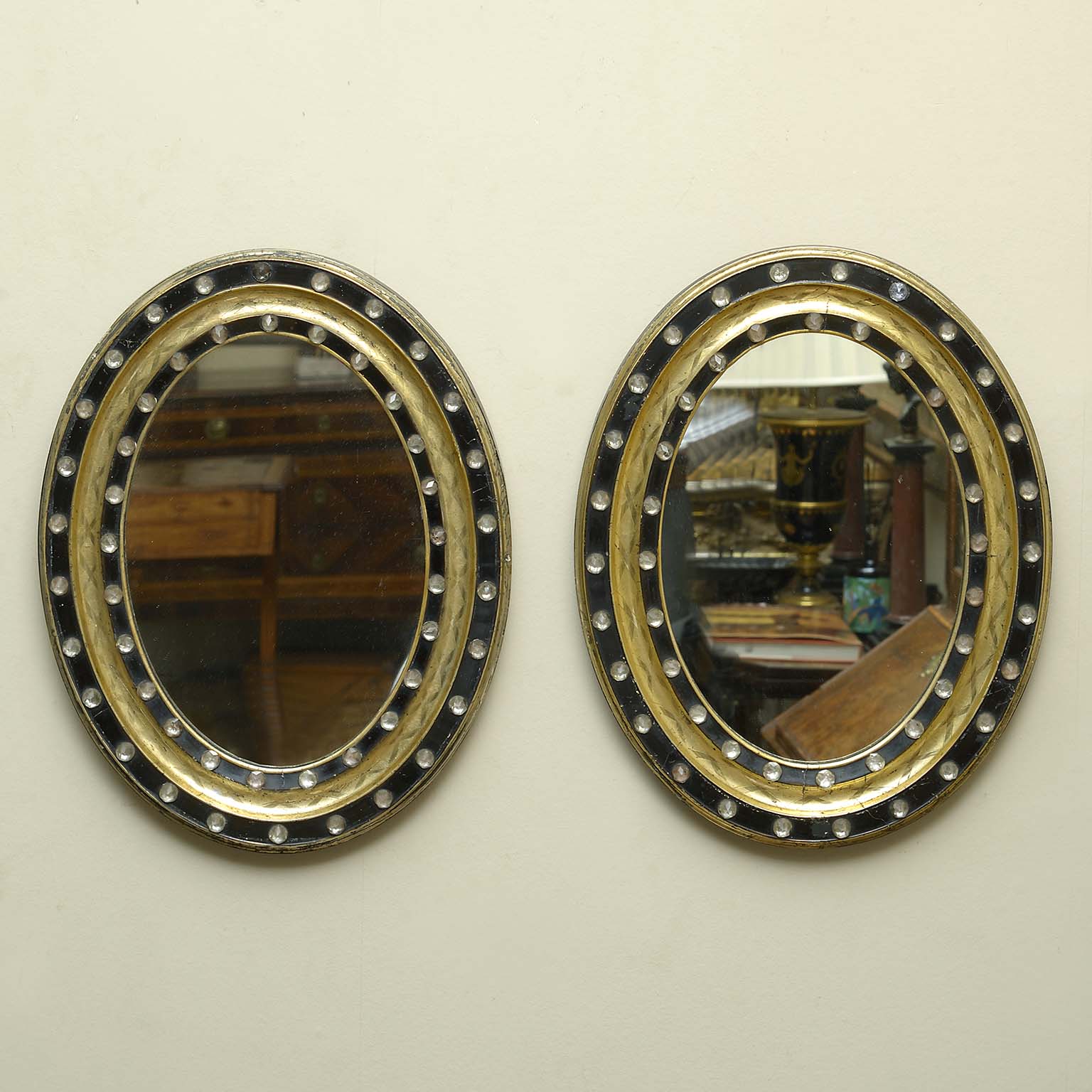 A Pair of Oval Irish Early Nineteenth Century Mirrors