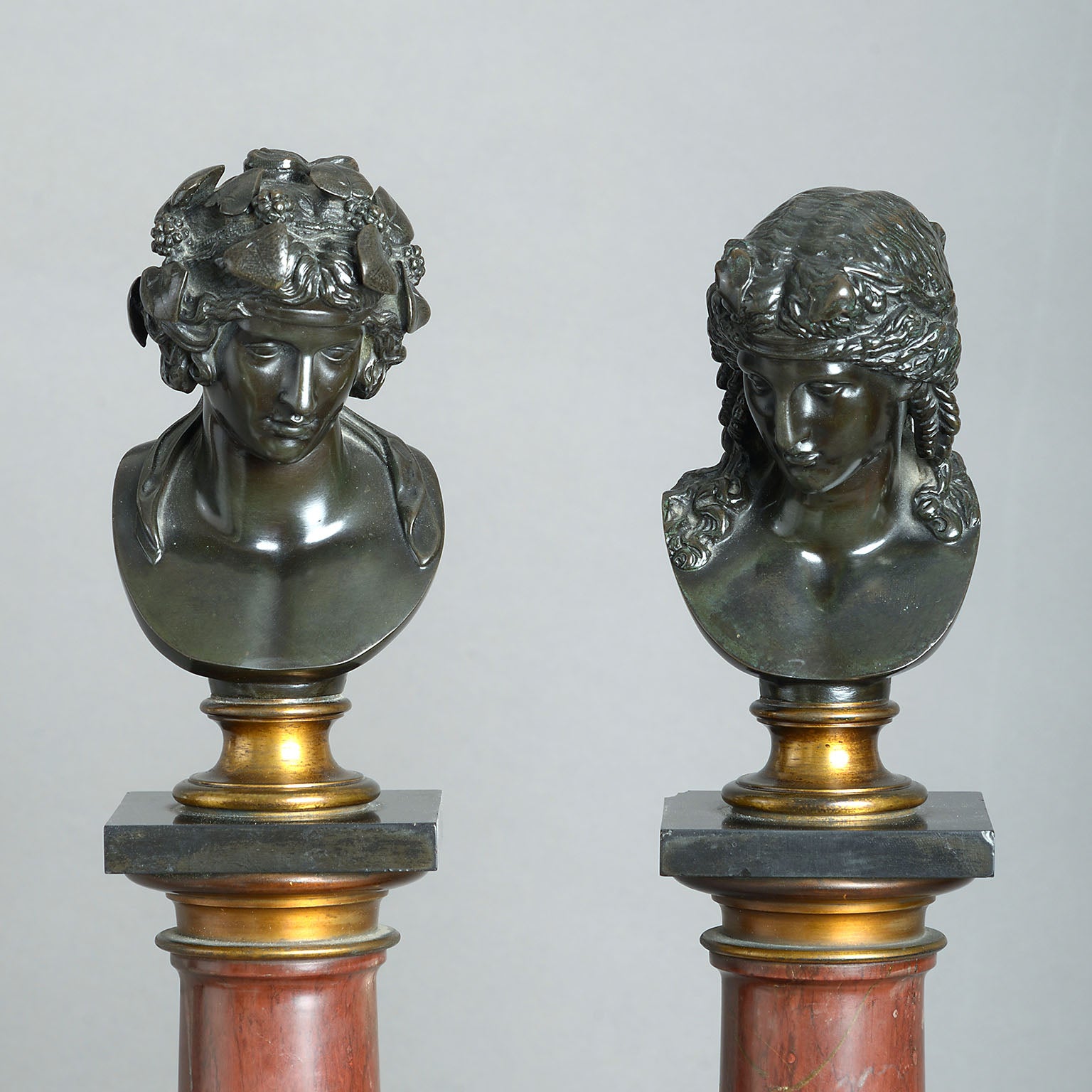Pair of Grand Tour Busts on Marble Columns