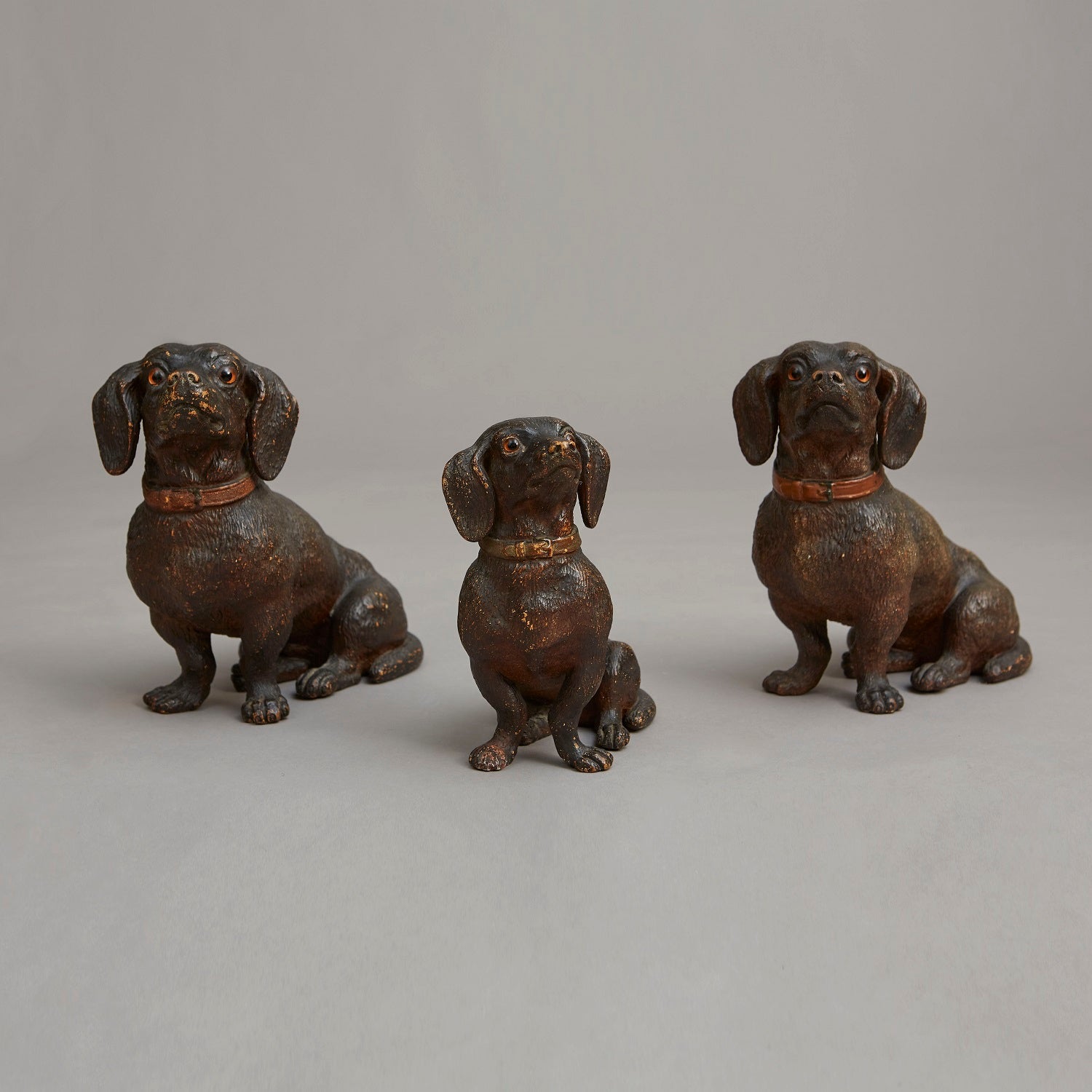 Collection of Terracotta Seated Dachshunds