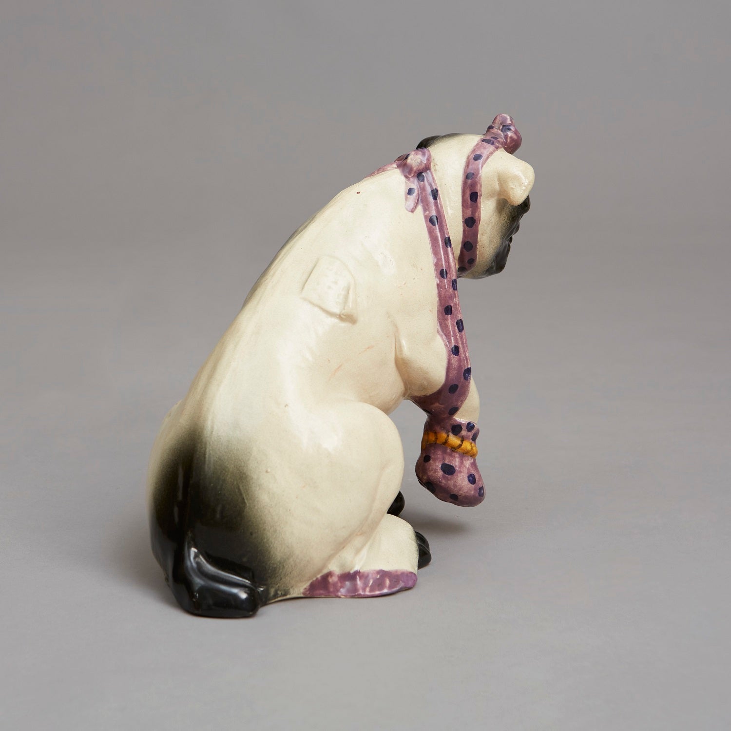 A Bretby Porcelain Seated Pug