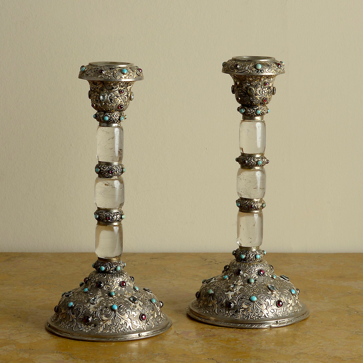 A Pair of Silver-Mounted and Gem Set Rock Crystal Candlesticks