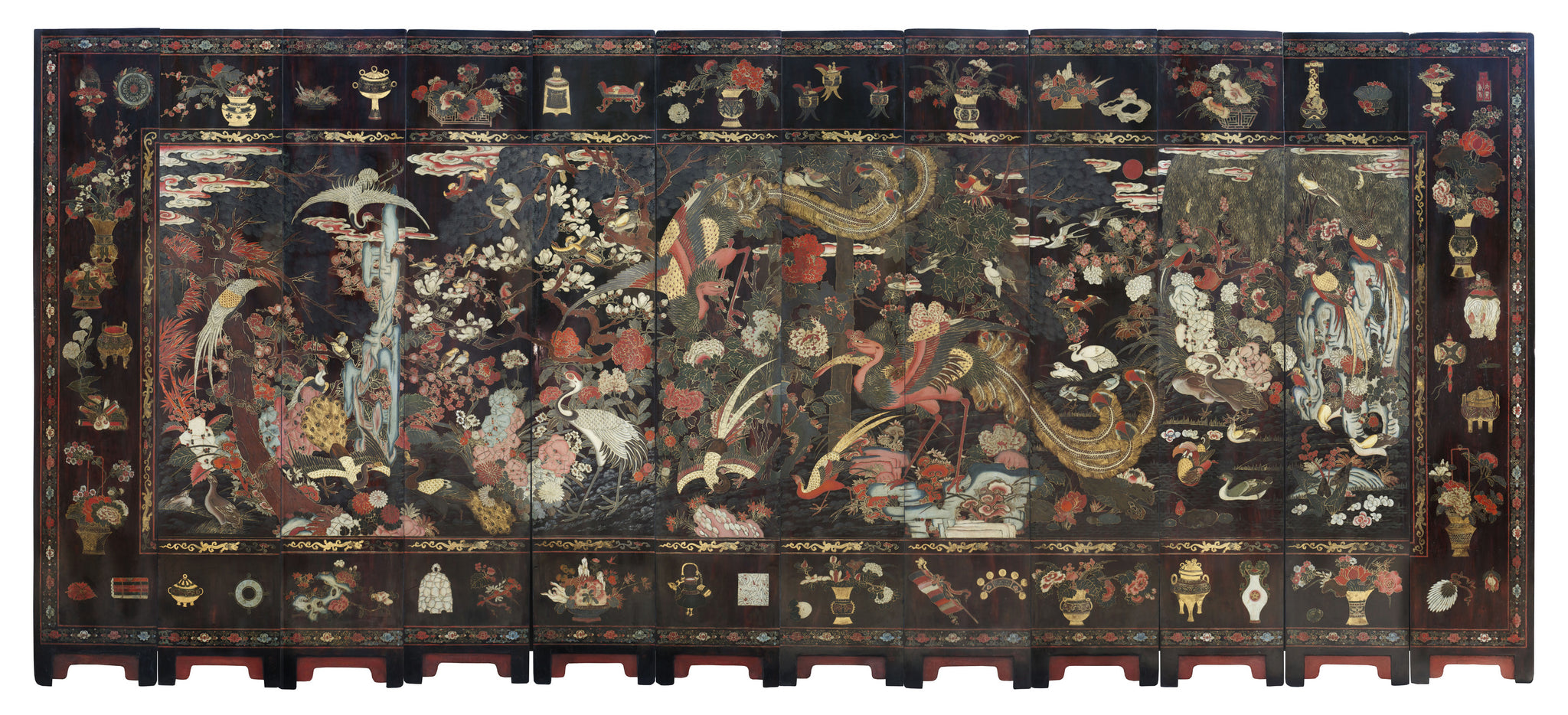 A RARE TWELVE PANEL POLYCHROME LACQUER SCREEN China,  Kangxi Period (1661-1722)  Early 18th Century