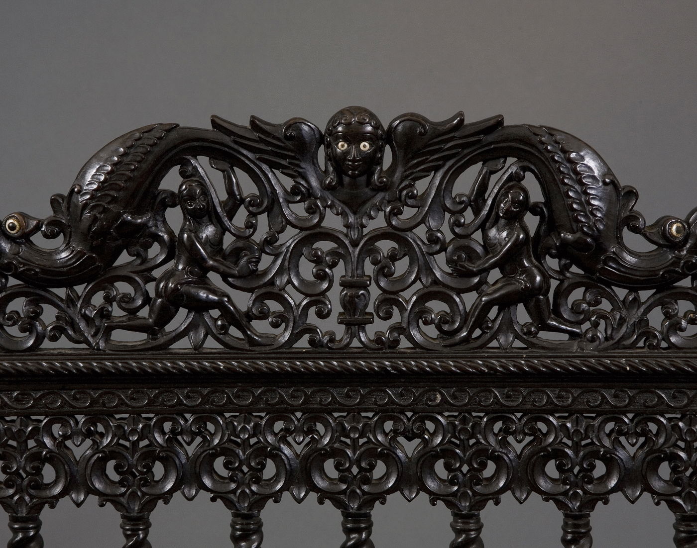 1.  A Pair Of Museum Quality Carved Ebony Chairs