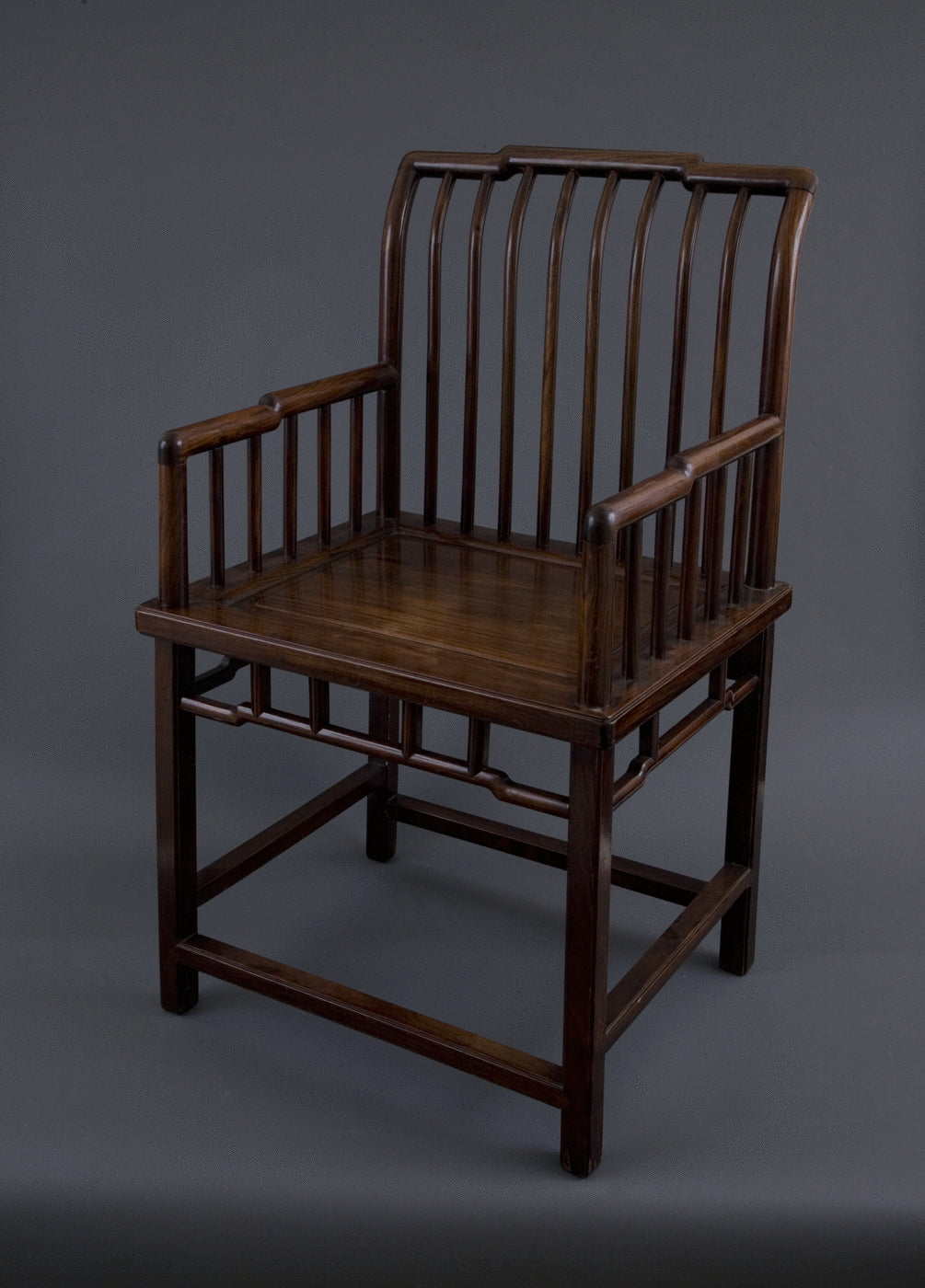 27.  A Chinese Spindle Back Rose Chair